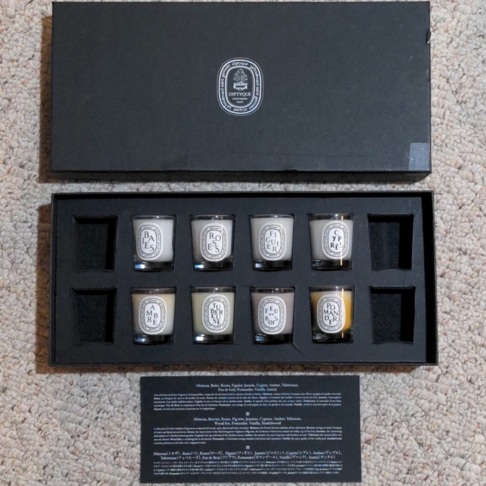 8 Diptyque mini candles in box